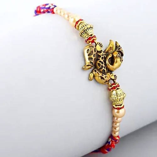 Ganesha Rakhi & Cadbury Silk In Best Bro Sleeve | Grocsy
