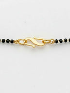 NVR Women Gold Plated Black Beaded Short Design Mangalsutra | Grocsy