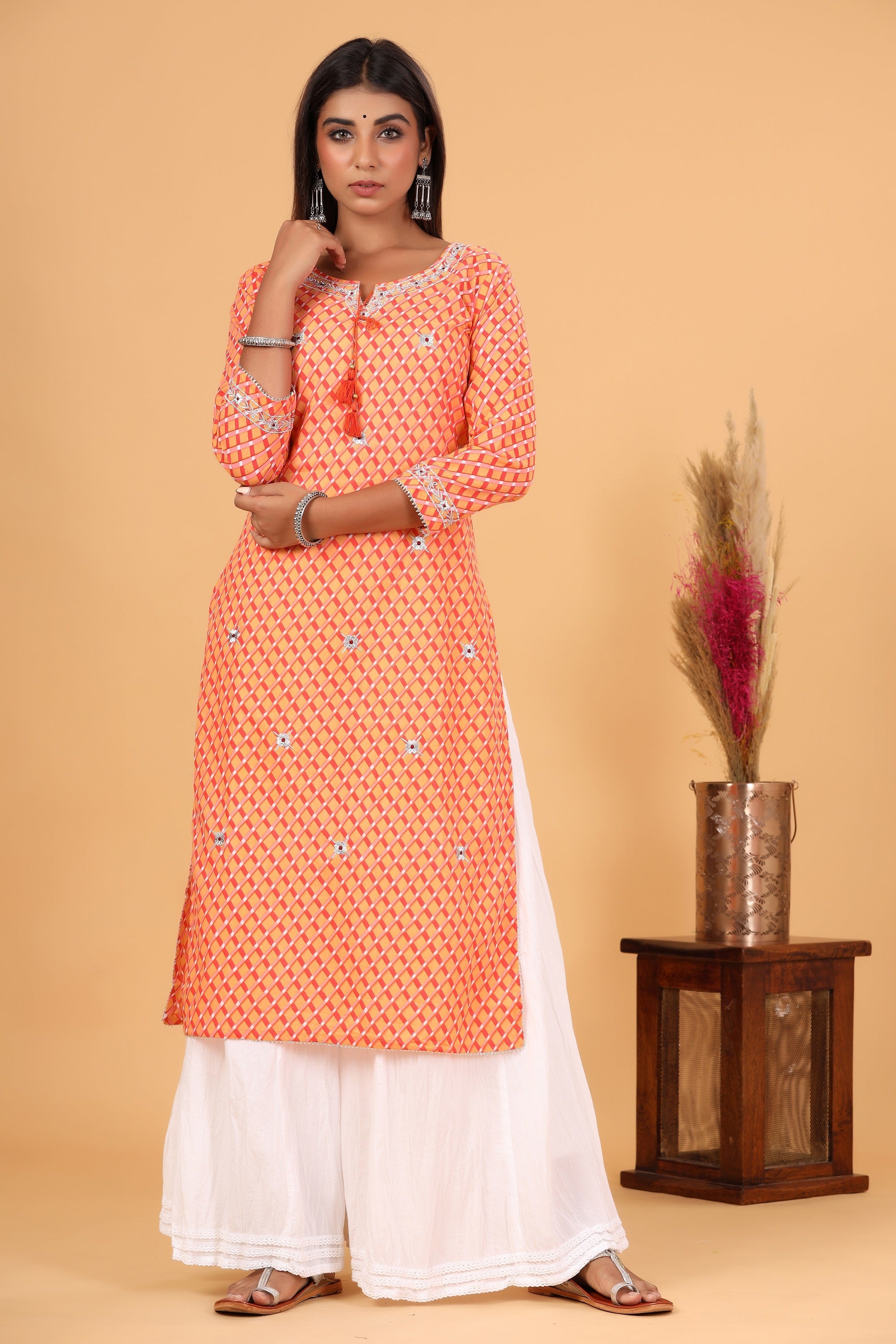 Kaajh Women's Orange Lehariya Print Kurta | Grocsy