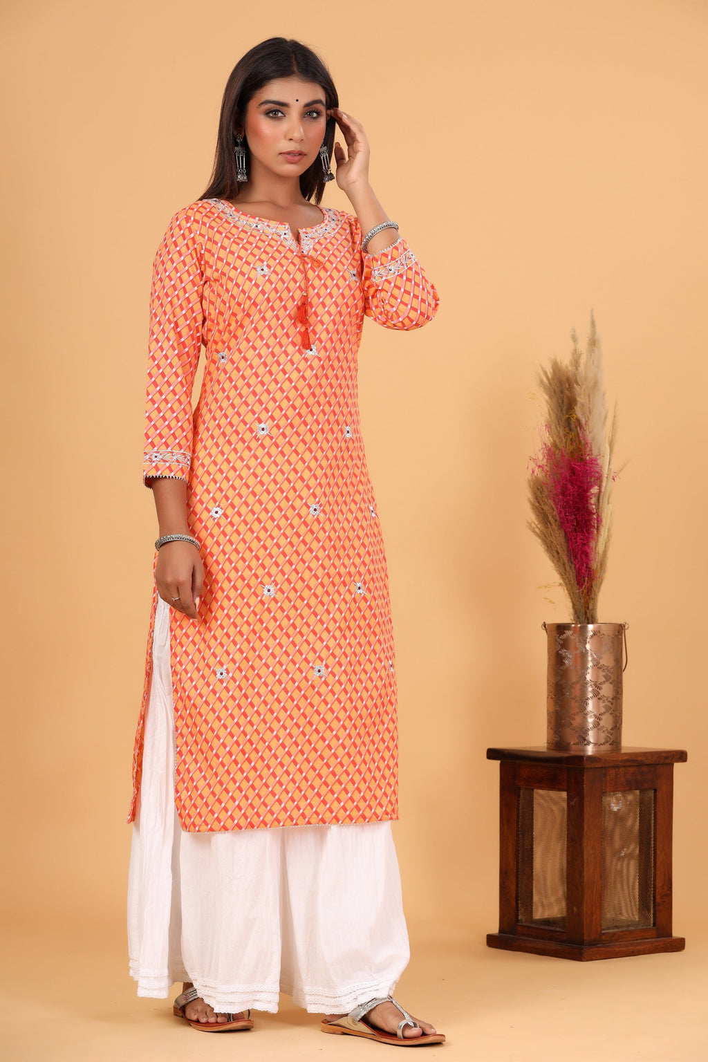 Kaajh Women's Orange Lehariya Print Kurta | Grocsy