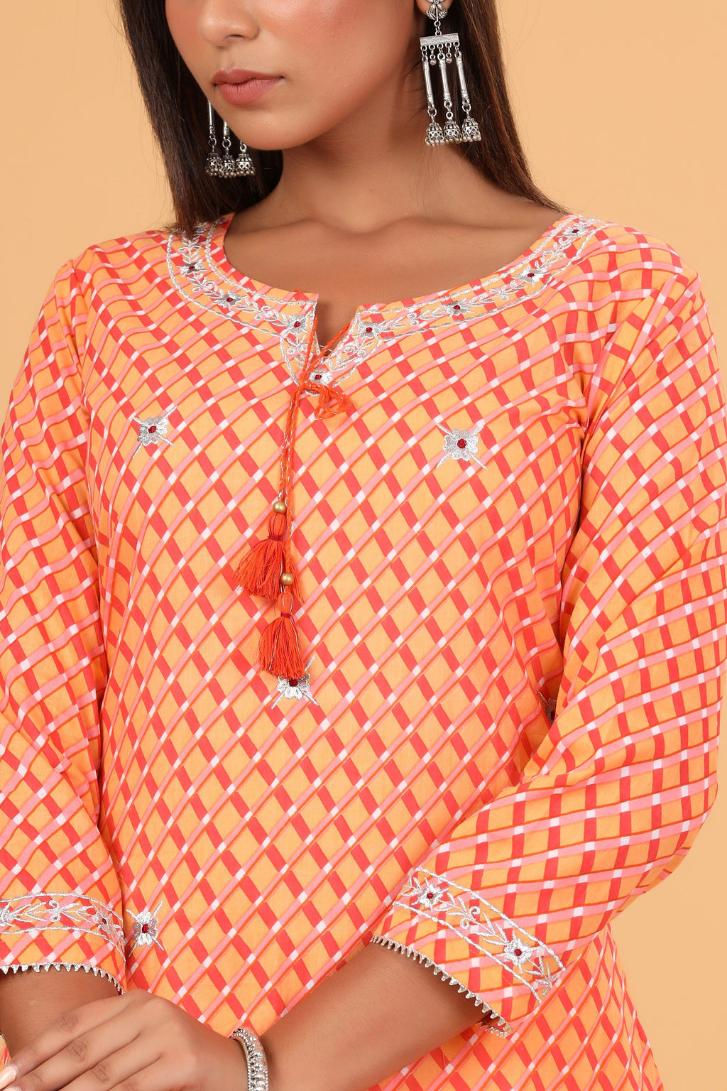 Kaajh Women's Orange Lehariya Print Kurta | Grocsy