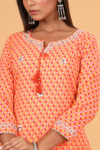 Kaajh Women's Orange Lehariya Print Kurta | Grocsy