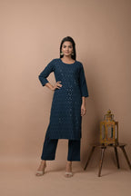 Kaajh Women's Navy Blue Solid Sequins Embellished Kurta Pant Set | Grocsy