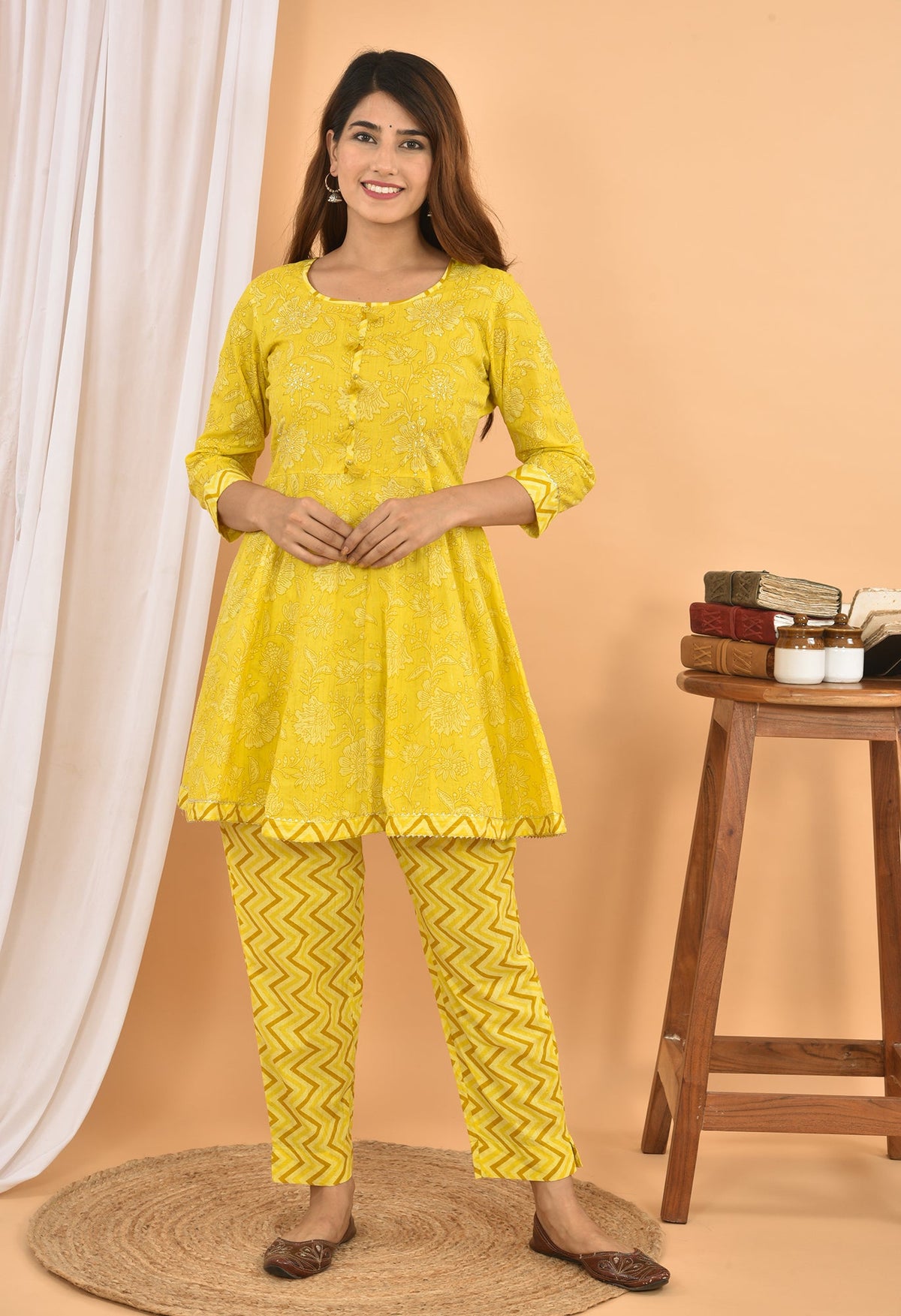 Kaajh Women's Yellow Floral Printed Mini Kurta Pant Set | Grocsy