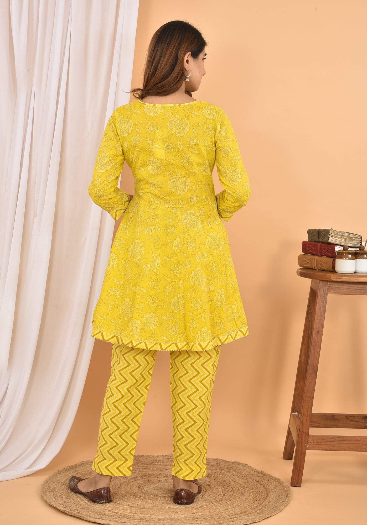 Kaajh Women's Yellow Floral Printed Mini Kurta Pant Set | Grocsy