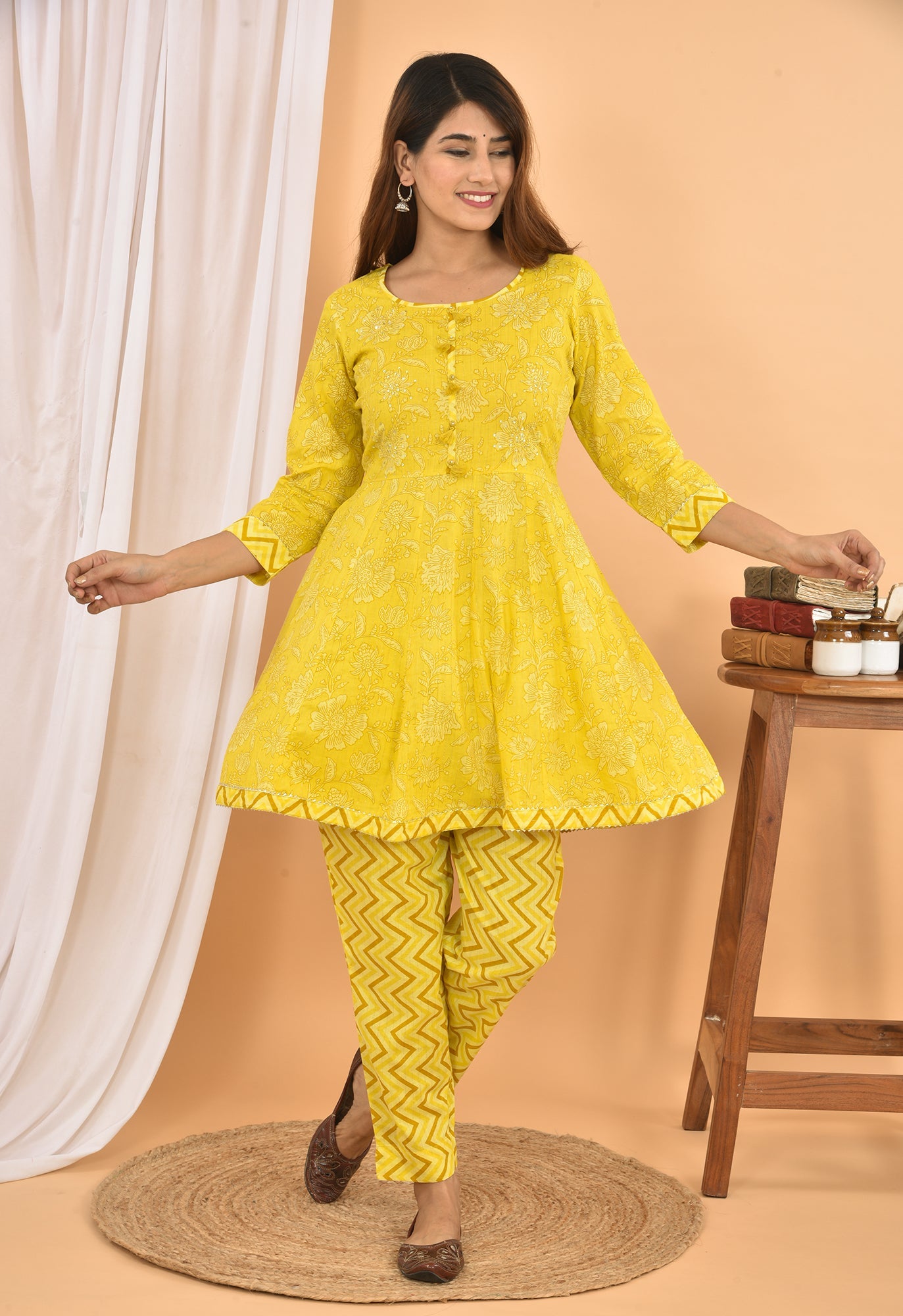Kaajh Women's Yellow Floral Printed Mini Kurta Pant Set | Grocsy