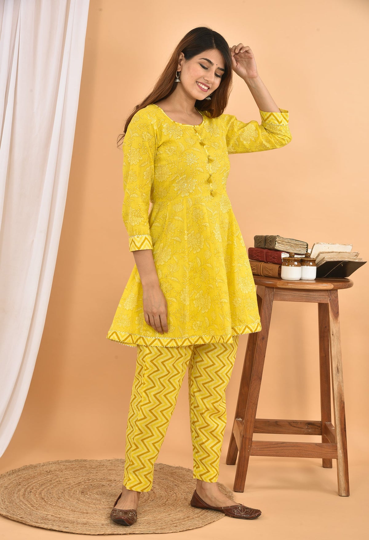 Kaajh Women's Yellow Floral Printed Mini Kurta Pant Set | Grocsy
