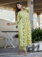 Kaajh Women's Yellow Floral Print Side Slit Cotton Kurta Pant Set | Grocsy
