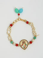 NVR Women & Men Set of 2 Multicolor Stone-Studded & Beaded Bhaiya Bhabhi Rakhi With Roli Chawal | Grocsy