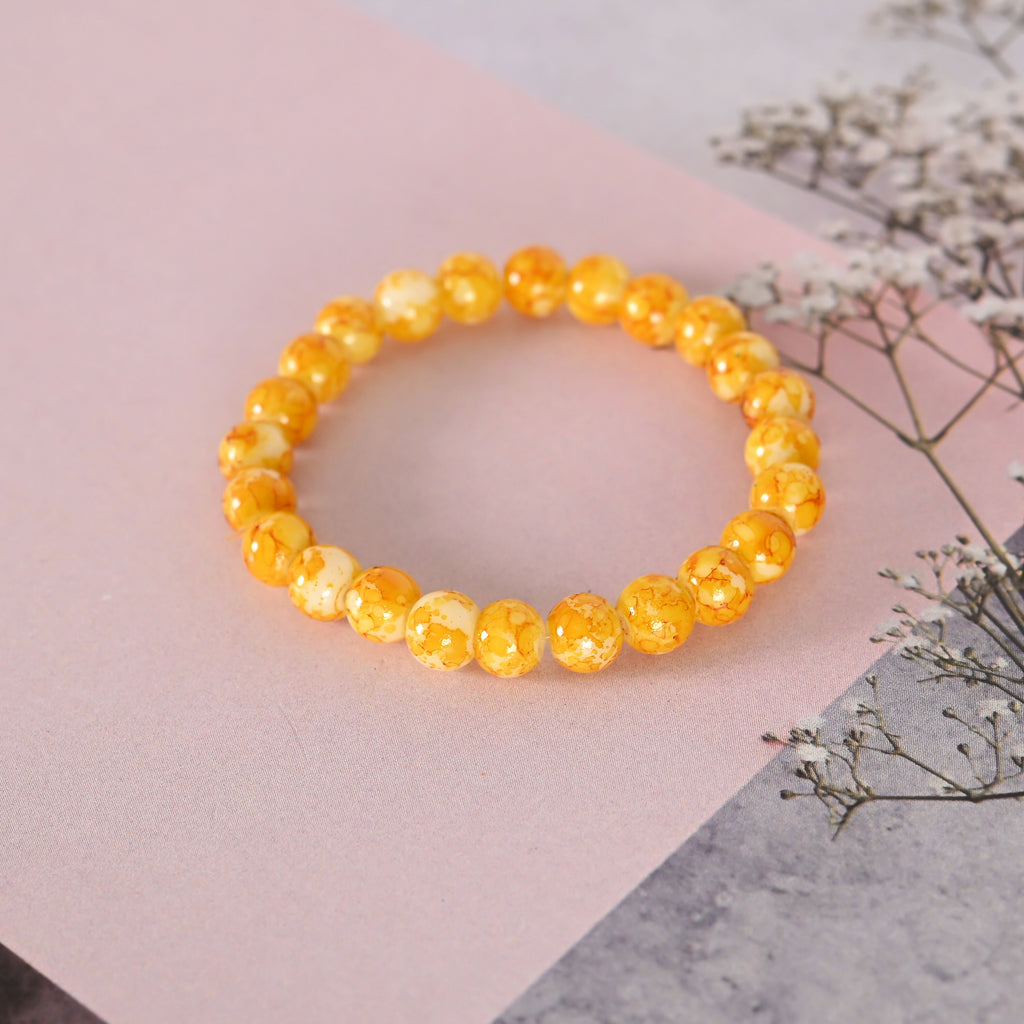 NVR Men & Women Yellow Marbel Crystal Elasticated Bracelet | Grocsy