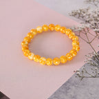 NVR Men & Women Yellow Marbel Crystal Elasticated Bracelet | Grocsy