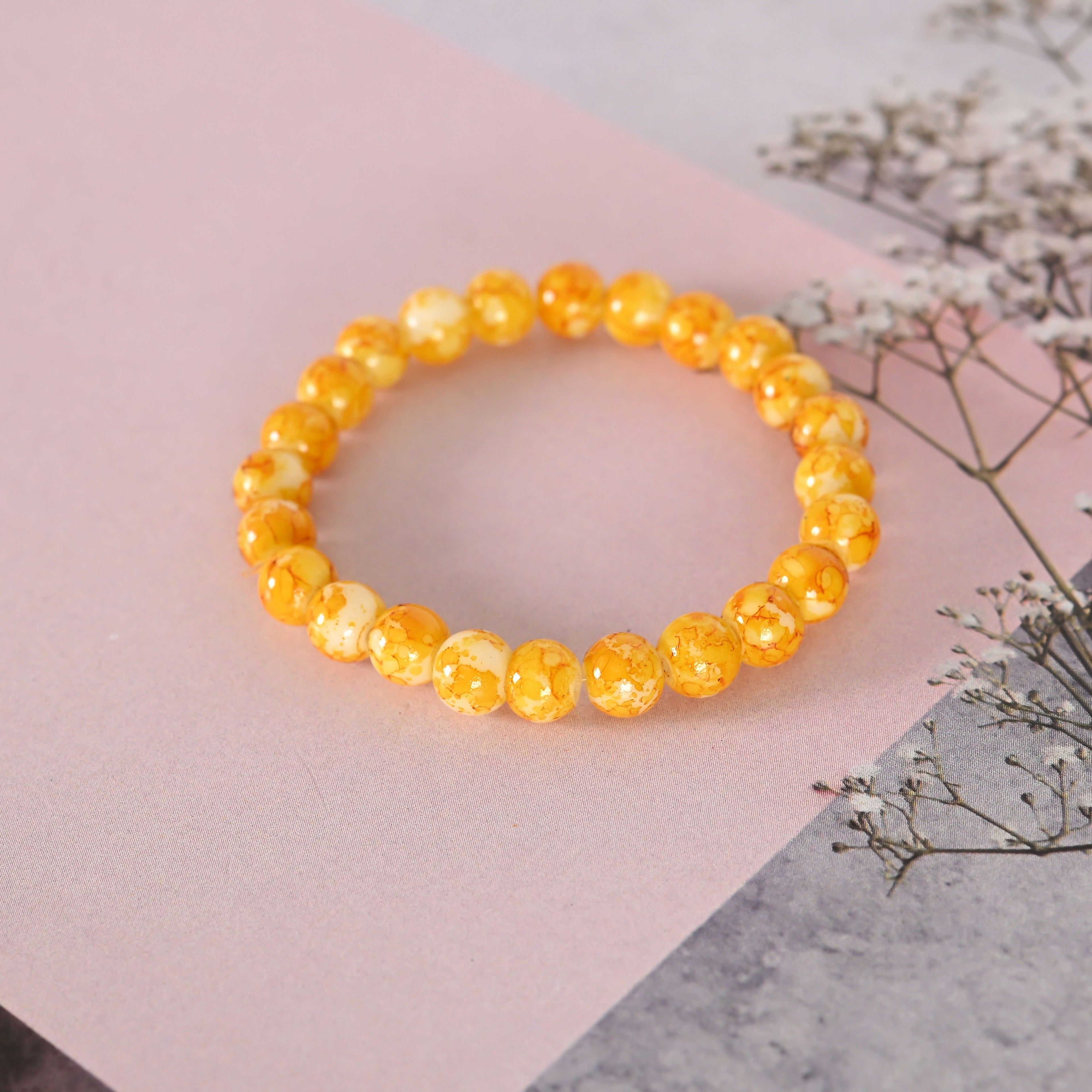 NVR Men & Women Yellow Marbel Crystal Elasticated Bracelet | Grocsy