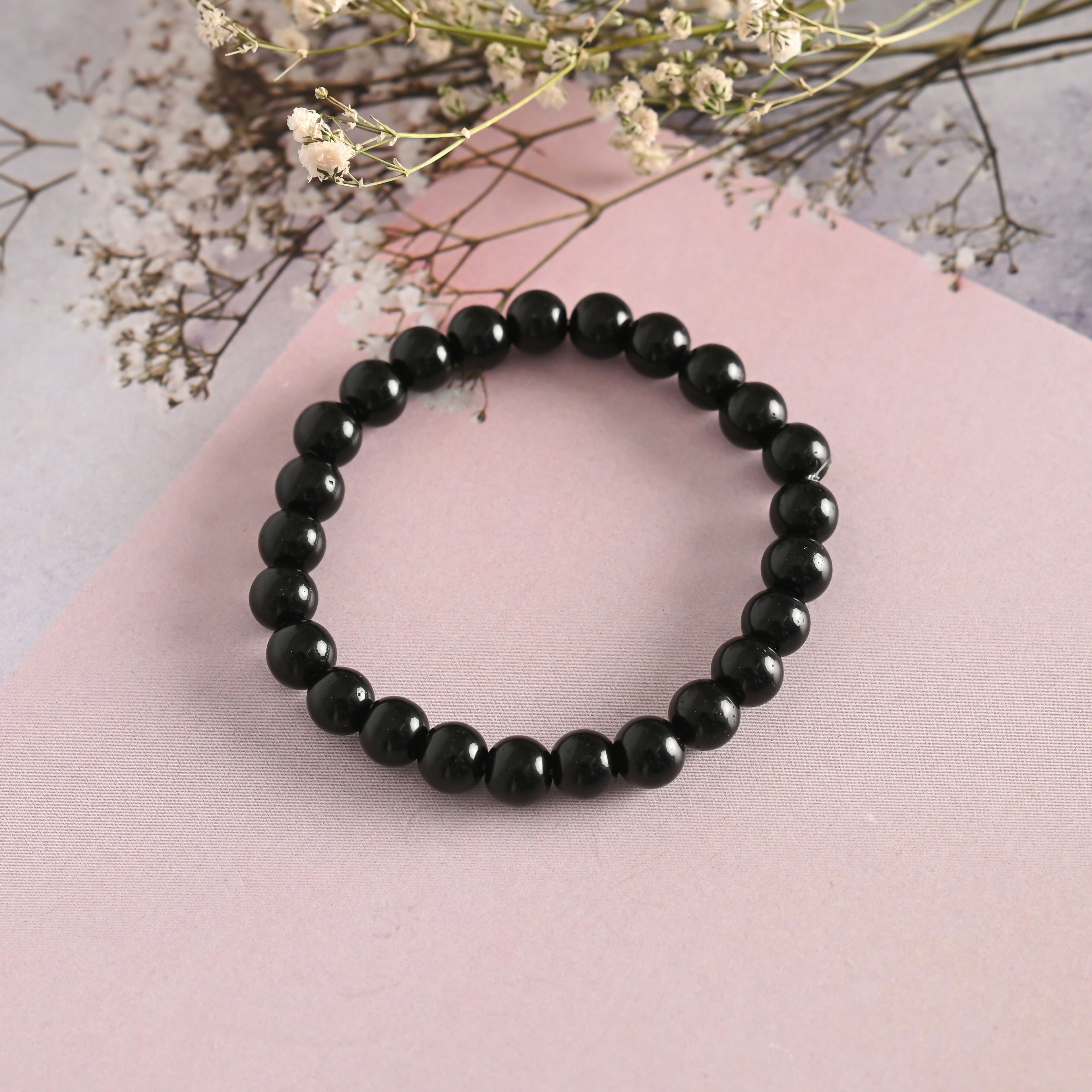 NVR Men & Women Black Marbel Crystal Elasticated Bracelet | Grocsy