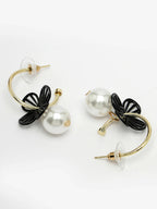NVR Women Gold-Toned Teardrop Shaped Drop Earrings | Grocsy