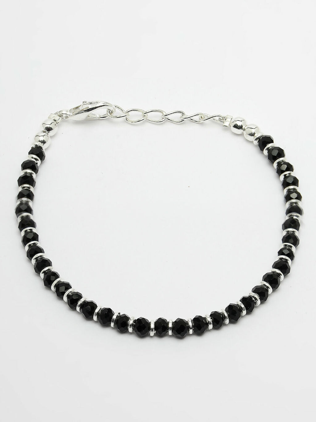 NVR Women Silver Plated Black Beaded Adjustable Rakhi With Roli Chawal | Grocsy