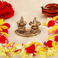 Estele Gold-Polished Goddess Laxmi & Lord Ganapati Idol for Pooja & Car Decor | Grocsy