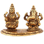 Estele Gold-Polished Goddess Laxmi & Lord Ganapati Idol for Pooja & Car Decor | Grocsy