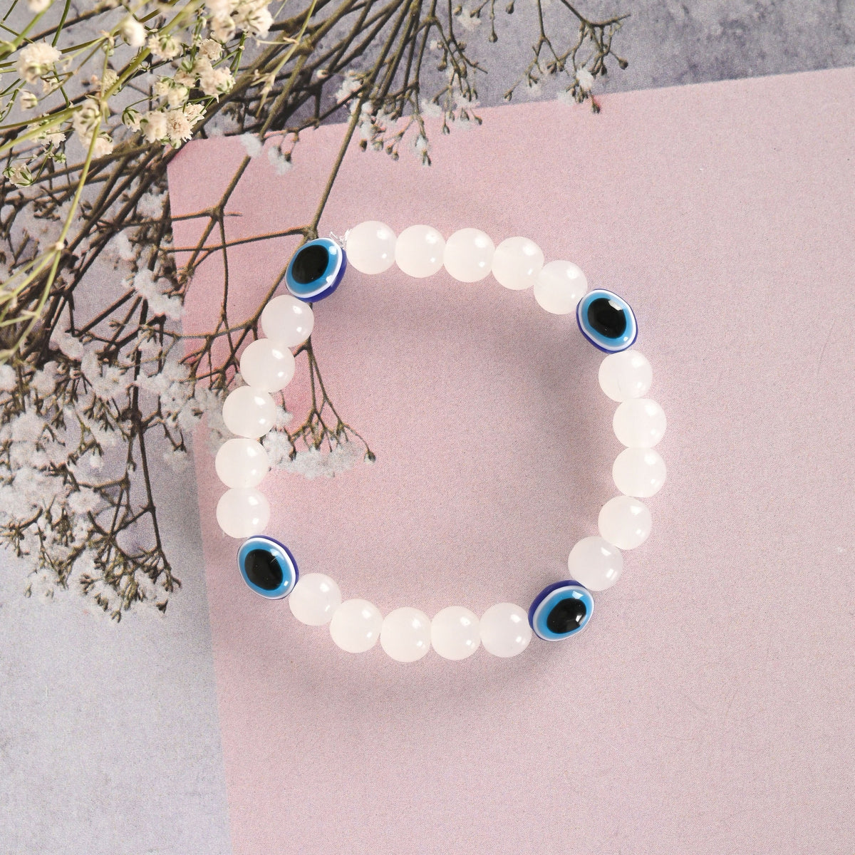 NVR Men & Women White Marbel Crystal Elasticated Bracelet | Grocsy