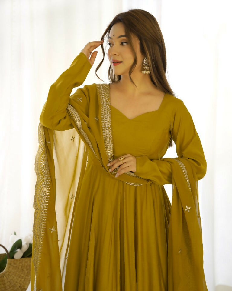 Teeya Creation Mustard Color Pure Roman Silk Chanderi Party Wear Fully Stitched Gown | Grocsy