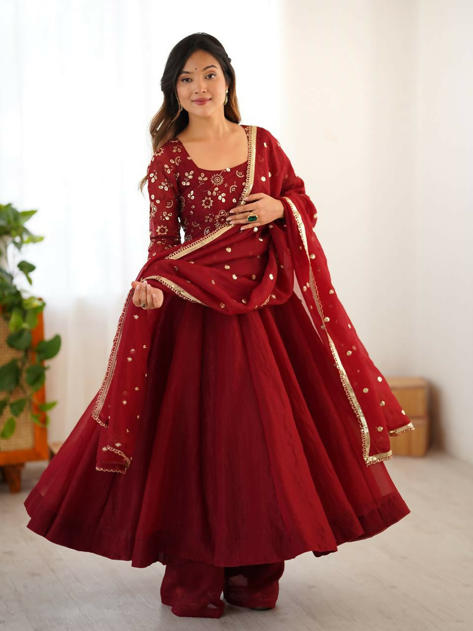 Teeya Creation New Trendy Stylish Elegant Finish With Full Flair Maroon Gown Set | Grocsy