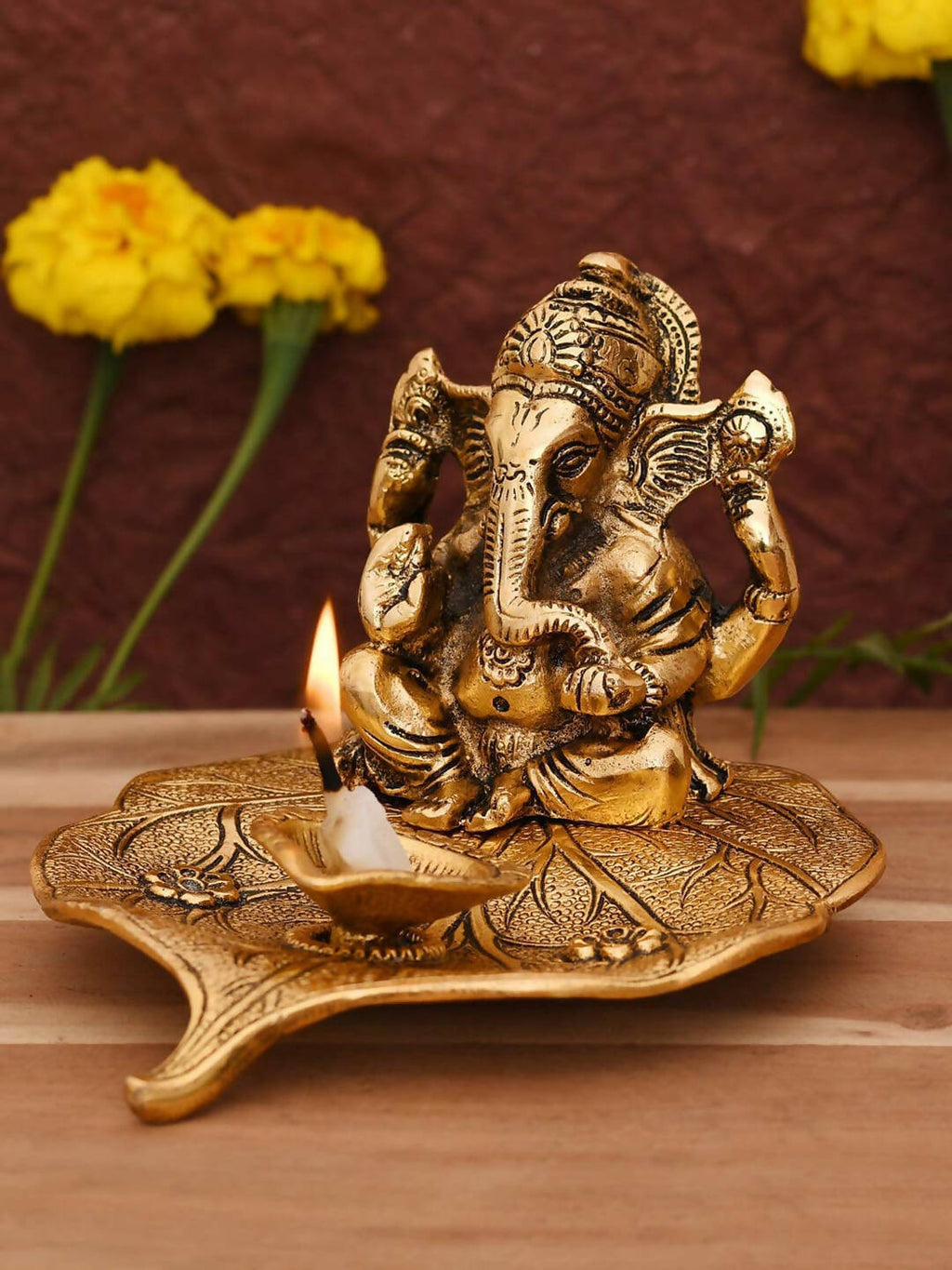 CraftVatika Gold Toned Aluminium Ganesh with Diya Idol | Grocsy