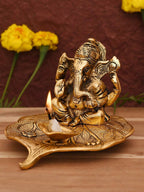 CraftVatika Gold Toned Aluminium Ganesh with Diya Idol | Grocsy