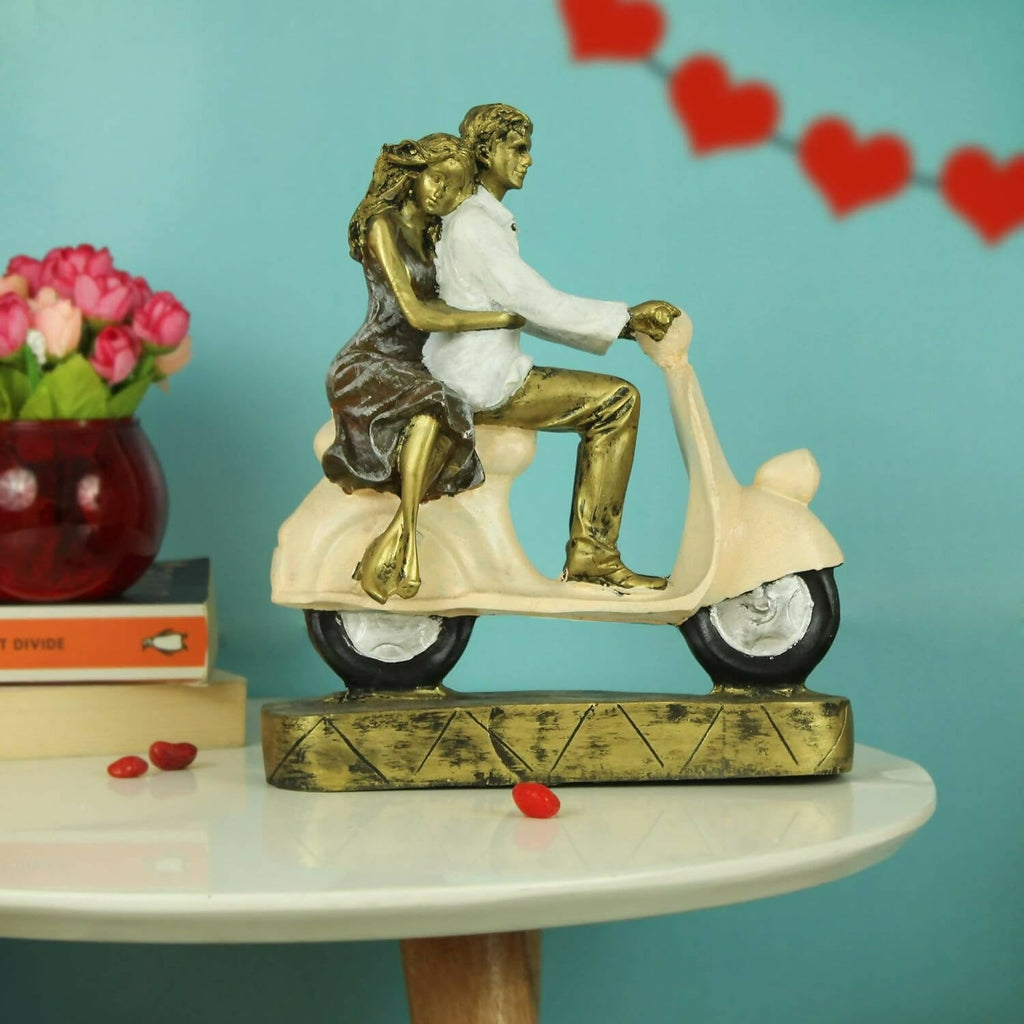 Tied Ribbons Romantic Love Couple On Scooter Showpiece Statue Decorative Items For Home | Grocsy