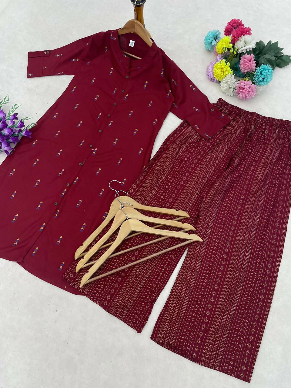 Teeya Creation Elegant Red Cotton Kurta Set Featuring Button Detail And Printed Palazzos | Grocsy