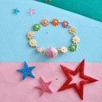 trueBrowns X Voylla Colourful Flowers Kid's Thread Rakhi For Kids | Grocsy