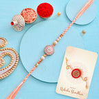 trueBrowns X Voylla Men's Orange Thread Traditional Design White Pearls Rakhi For Brother | Grocsy