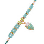 trueBrowns X Voylla Turquoise Beads Kid's Fruit Motif Rakhi For Kids | Grocsy