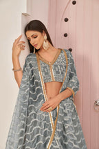 Aastha Fashion Gray Butterfly Net White Cotton Thread Work, Zari Work And Sandwich Sequence Work Embroidery Wedding Wear Lehenga Choli | Grocsy