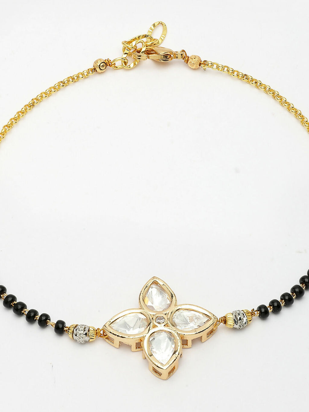 NVR Women Gold-Polished & Black Brass Stone-Studded Hand Mangalsutra Link Bracelet | Grocsy