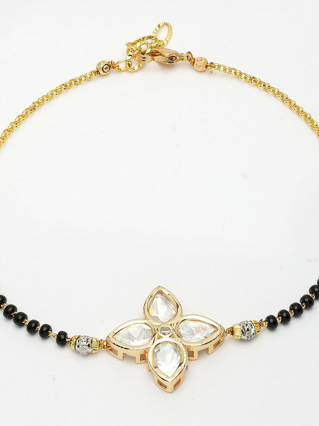 NVR Women Gold-Polished & Black Brass Stone-Studded Hand Mangalsutra Link Bracelet | Grocsy