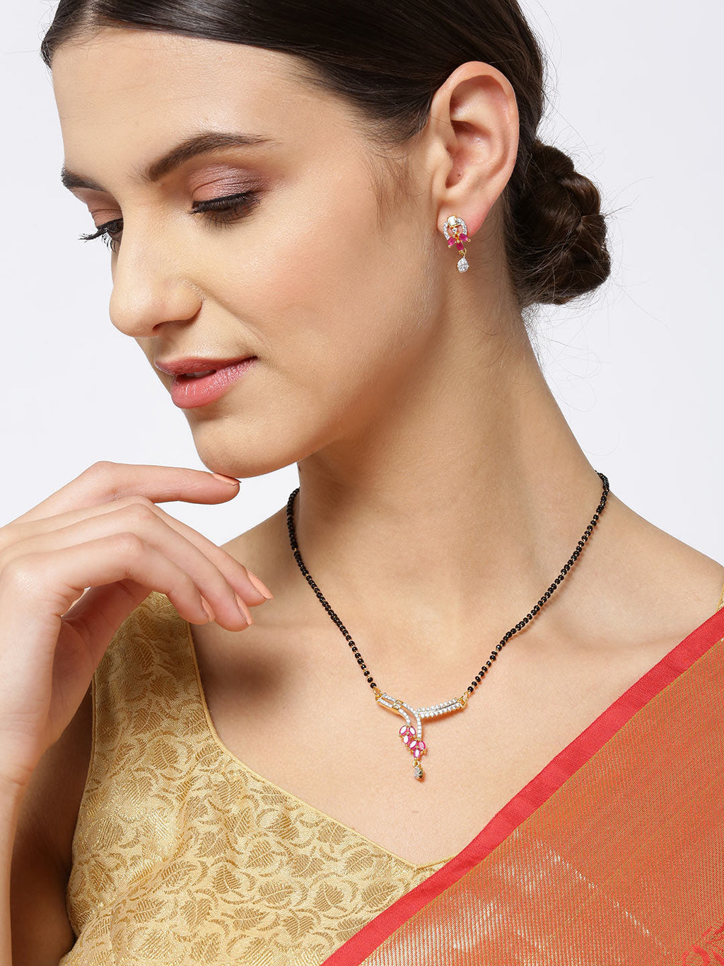 Priyaasi Women Gold-Polished American Diamond and Ruby Studded Mangalsutra Set with Earrings in Floral Pattern - Noz2Toz