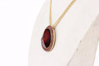 Gold-Polished Alloy Assymetric Stone Studded Pendant Necklace - The Pari | Grocsy