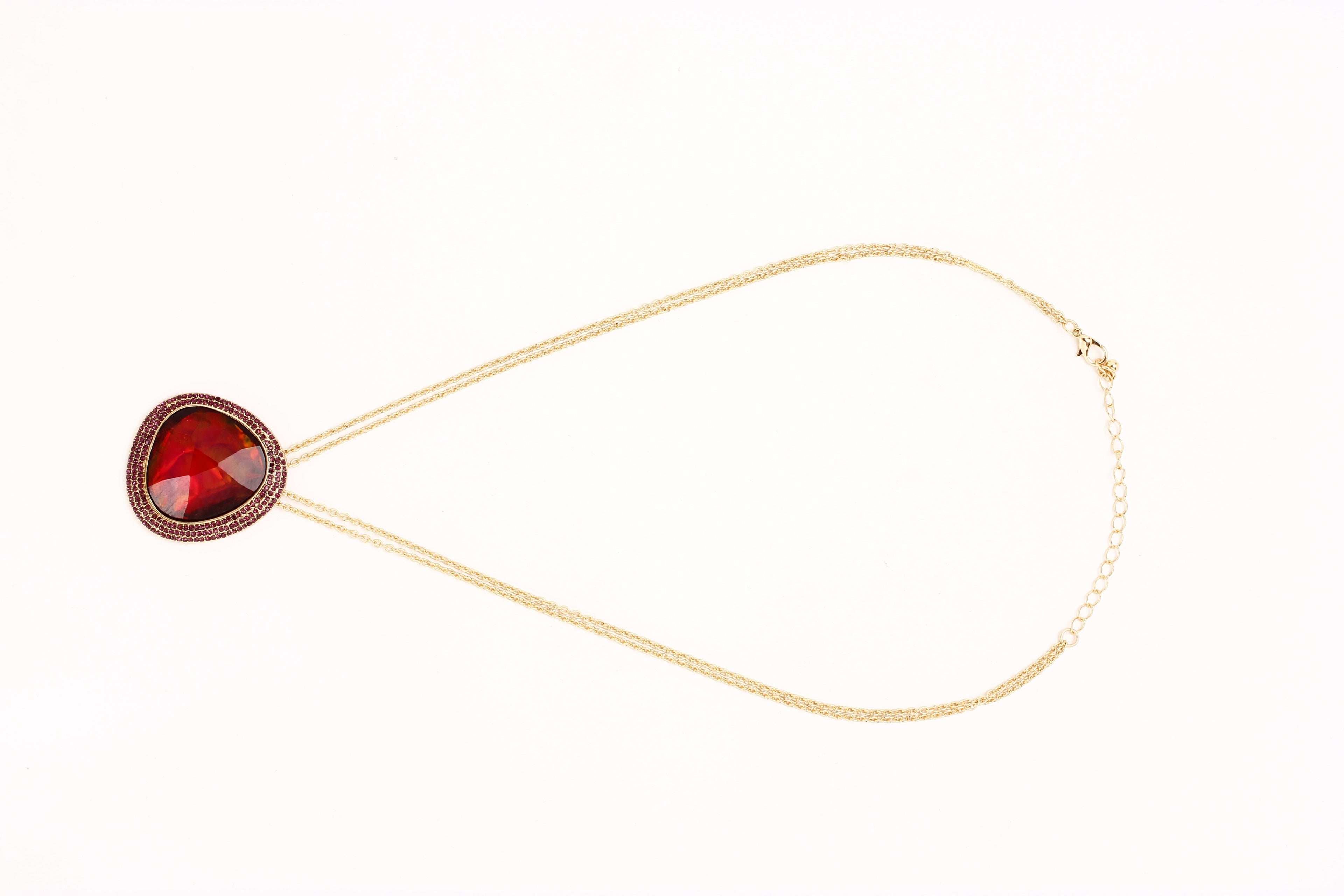 Gold-Polished Alloy Assymetric Stone Studded Pendant Necklace - The Pari | Grocsy