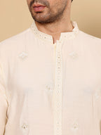 MULTI SHADES Men's Cream Straight Viscose Silk Kurta With Embroidered Neckline And Motifs,Cream Solid Trouser Style Churidar | Grocsy