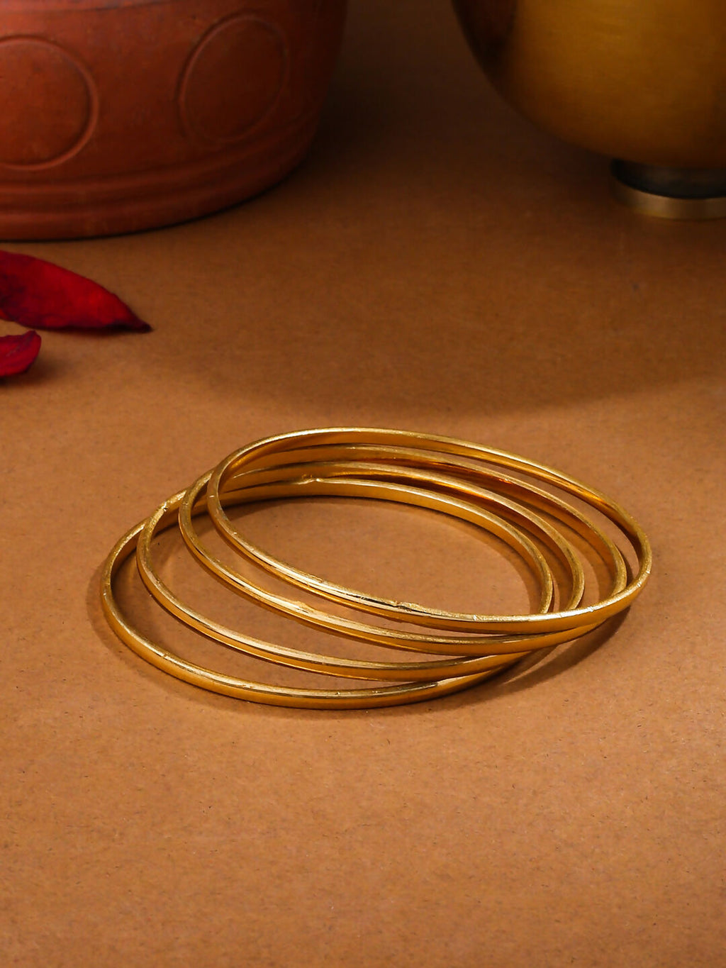 NVR Women's Set of 4 Gold-Polished Traditional Daily Use Bangles | Grocsy