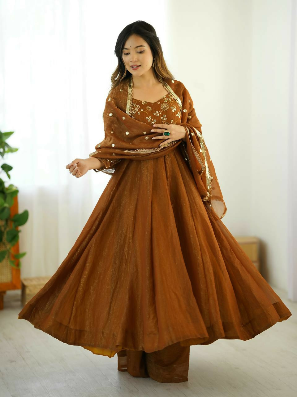 Teeya Creation New Trendy Stylish Elegant Finish With Full Flair Gold Gown Set | Grocsy