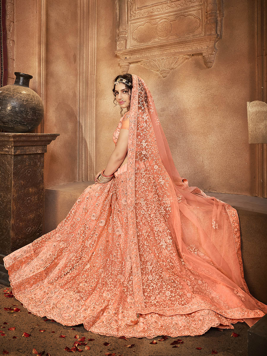 Myra Peach Heavy Embroidered Net Lehenga | Grocsy