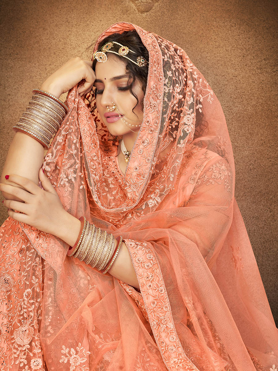 Myra Peach Heavy Embroidered Net Lehenga | Grocsy
