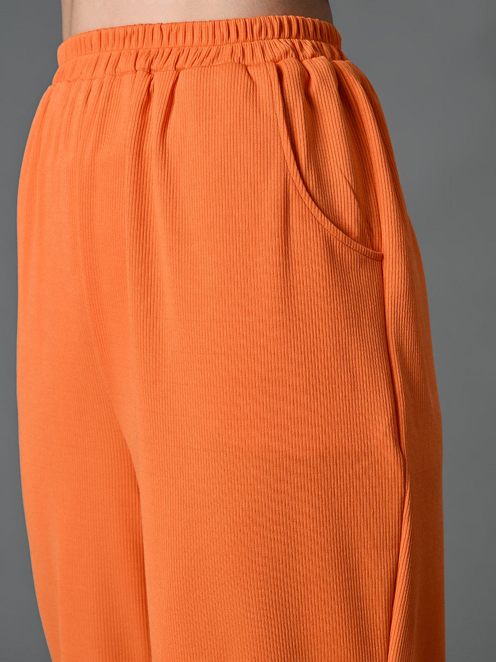 Myshka Women's Solid Ribbed High-Rise Wide Leg Casual Trousers in Orange Color | Grocsy