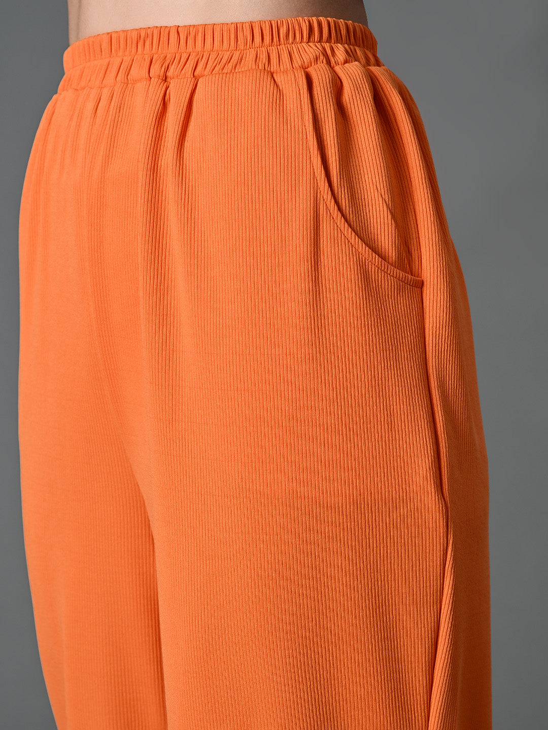 Myshka Women's Solid Ribbed High-Rise Wide Leg Casual Trousers in Orange Color | Grocsy