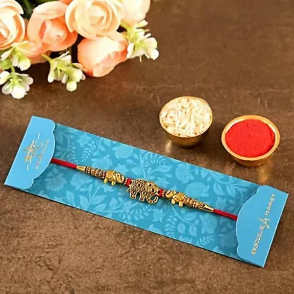 Ethnic Elephant Pearl Rakhi & Soan Papdi | Grocsy