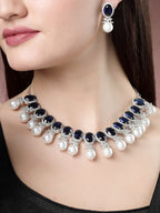 NVR Women's Silver-Plated Blue American Diamond Studded Handcrafted Jewellery Set | Grocsy