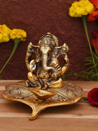 CraftVatika Gold Toned Aluminium Ganesh with Diya Idol | Grocsy