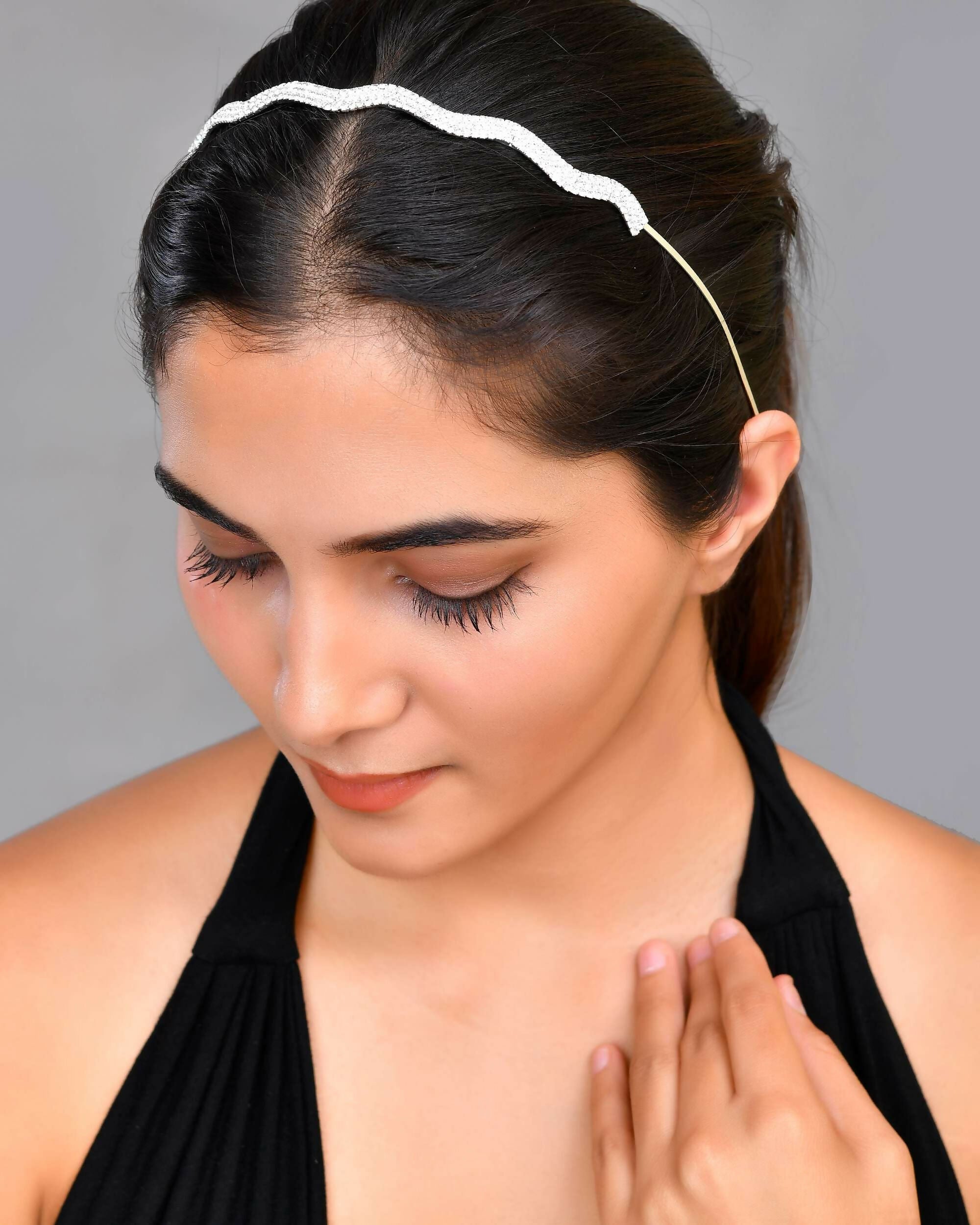 VOJ Silver Plated AD Studded Wave Shaped Hairband | Grocsy