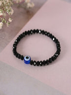 NVR Women & Men Black Evil Eye Elasticated Rakhi With Roli Chawal | Grocsy