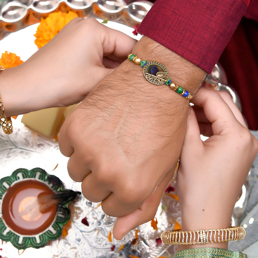 trueBrowns X Voylla Radha Krishna Peacock Feather Beaded Thread Rakhi | Grocsy